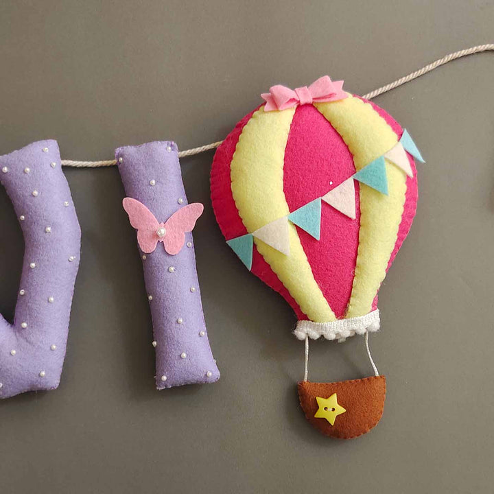 Hand Stitched Sleeping Baby Themed Round Felt Kids Name Plate For Kids - Close-up of Hanging Fabric Ornament