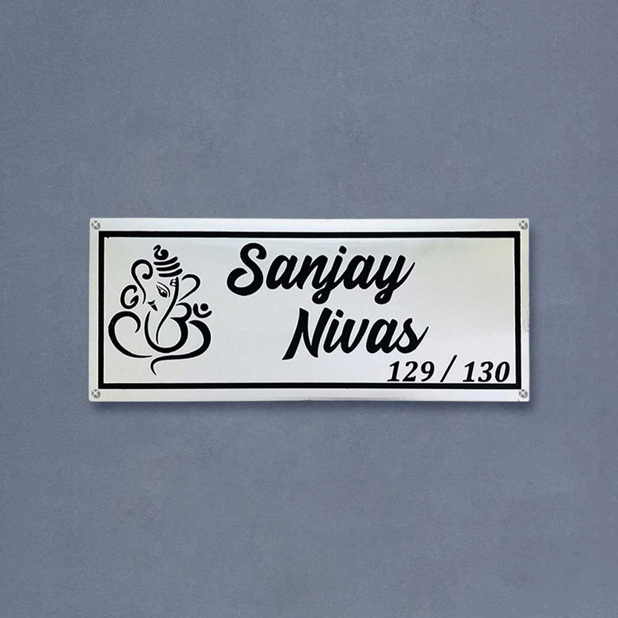 Personalized Waterproof Rectangle Ganesha Theme Steel Name Plate - Front View on Wall Background
