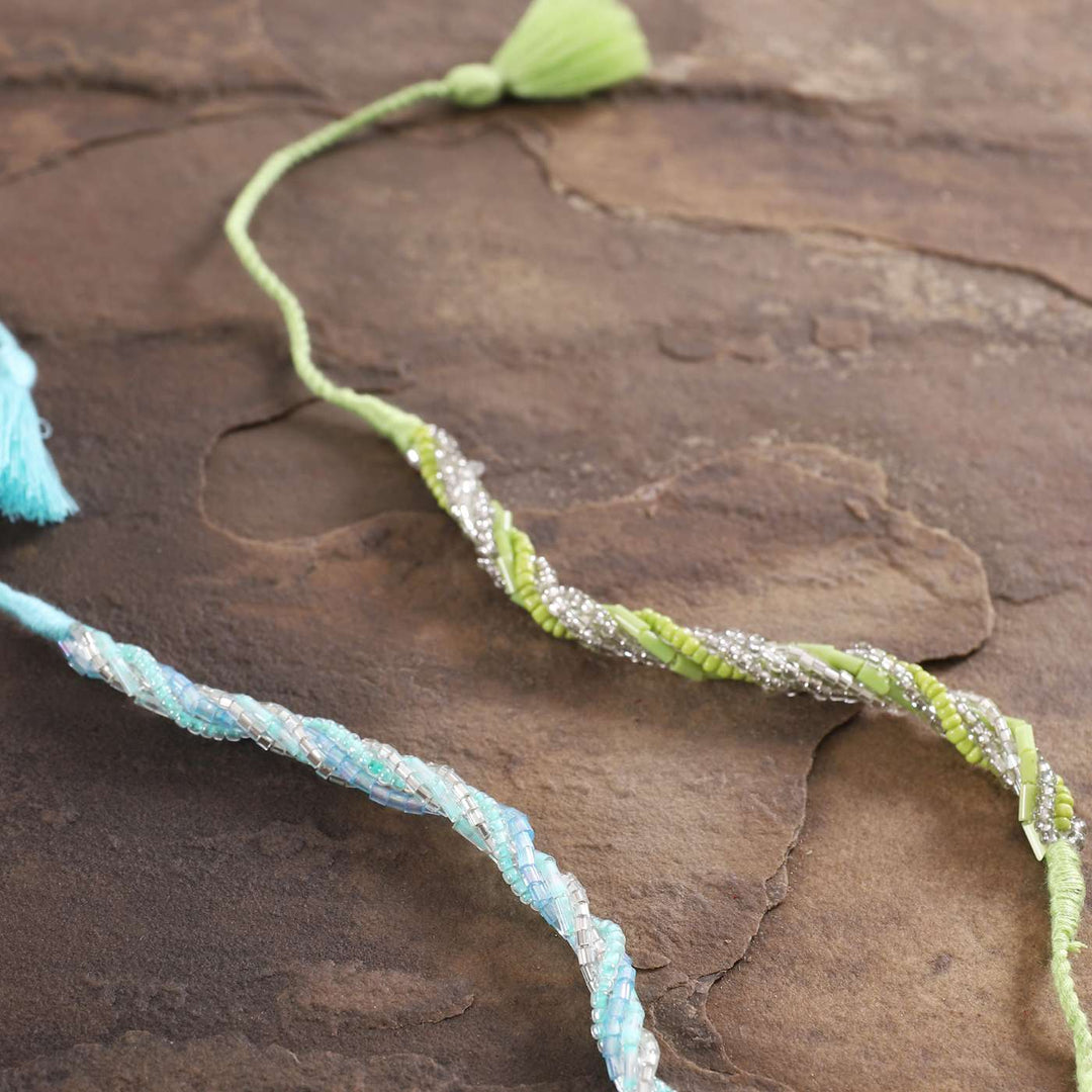 Handmade Beaded Zari Strings Rakhi With Roli Chawal Set Of 2 - Close-up of Beaded Sections