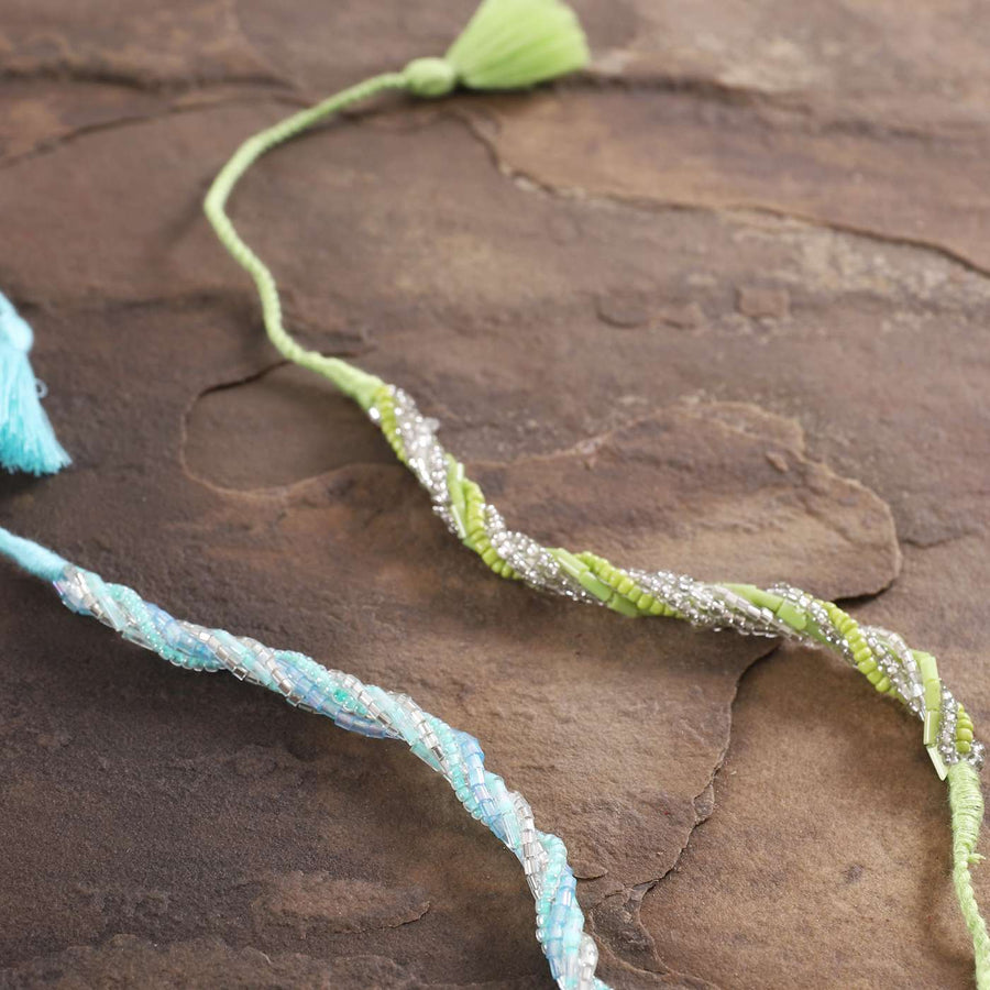 Handmade Beaded Zari Strings Rakhi With Roli Chawal Set Of 2 - Close-up of Beaded Sections