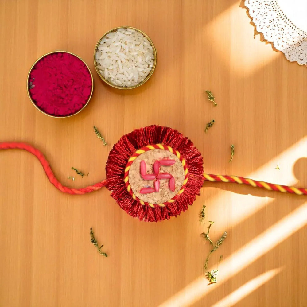 Swastik Plantable Eco Friendly Handmade Cork Rakhi With Roli Chawal - Front View with Rice and Kumkum
