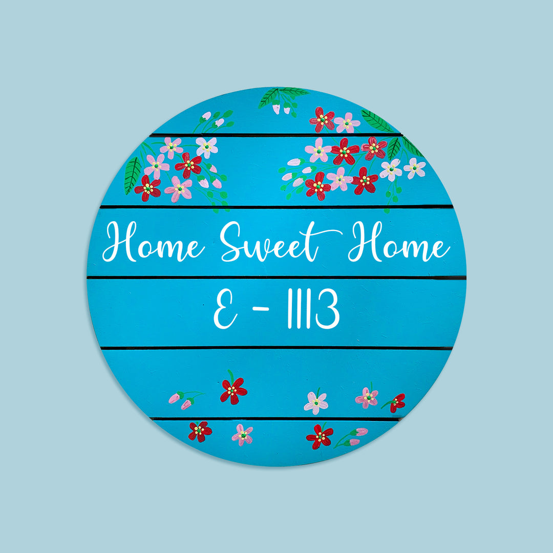 Hand Painted Floral Name Plate 1 - Front View on Blue Background