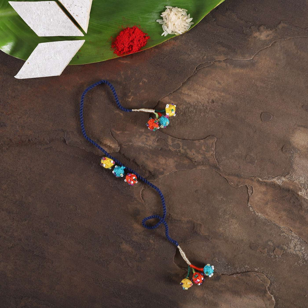 Handmade Beaded Dark Blue Dori Rakhi With Roli Chawal - Styled with traditional items