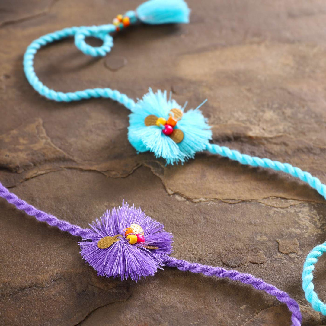 Handmade Threads Cotton Rakhi With Roli Chawal Set Of 2 - Close-up of decorative knots