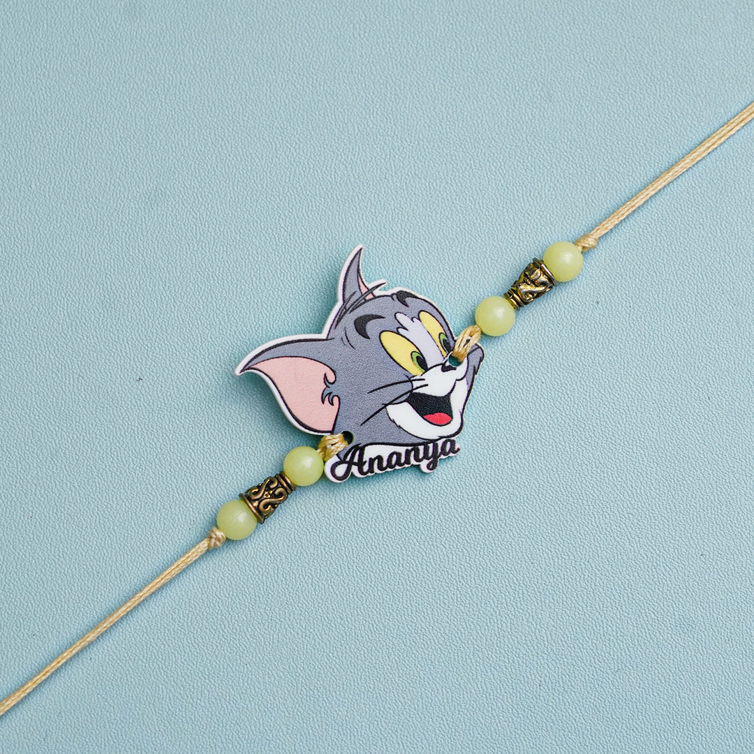Personalized Handmade Tom And Jerry Acrylic Kids Rakhi With Roli Chawal - Front View with Name Personalization
