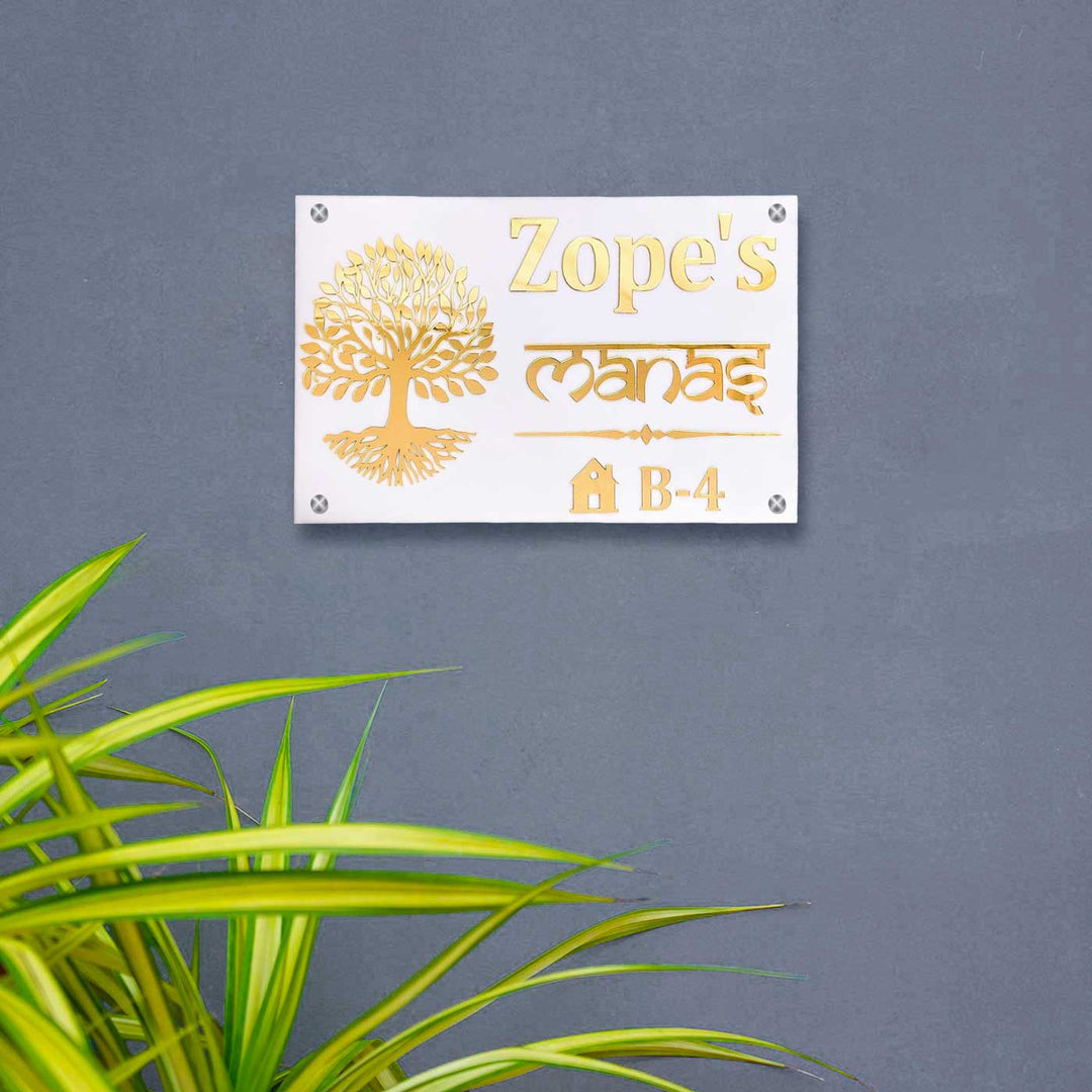 Personalized Waterproof Golden Tree Design Acrylic Led Name Plate - Mounted on Grey Wall with Plant
