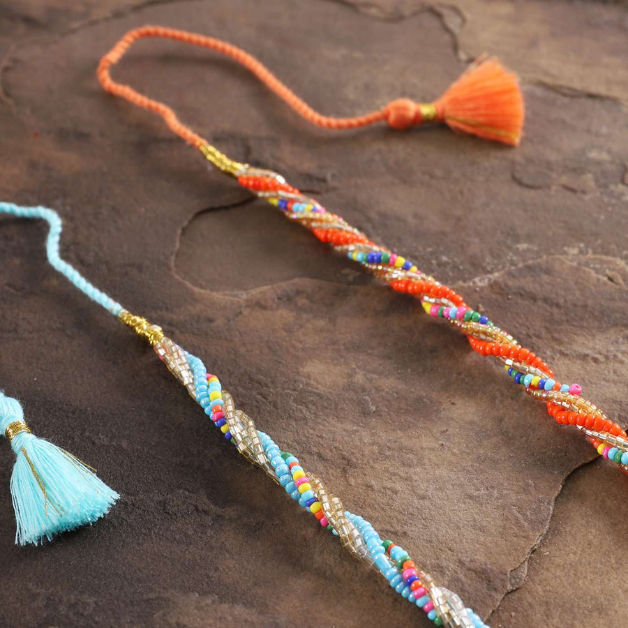 Handmade Beaded Twister Rakhi With Roli Chawal Set Of 2 - Close-up of Beaded Tassel Ends