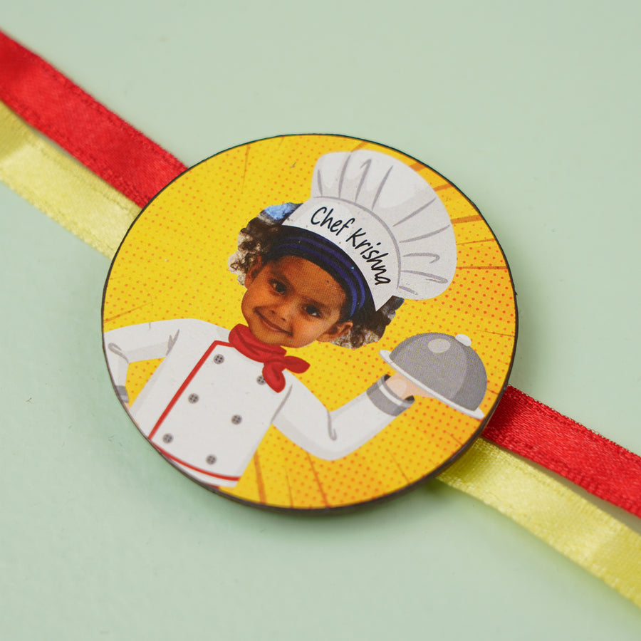 Photo Personalized Handmade Reusable Caricature Little Chef Mdf Wood Kids Rakhi With Roli Chawal - Close-up of personalized badge