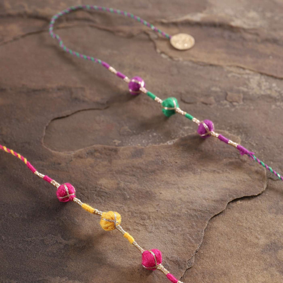 Handmade Zari Dori Fabric Rakhi With Roli Chawal Set Of 2 - Close-up of Thread and Beads