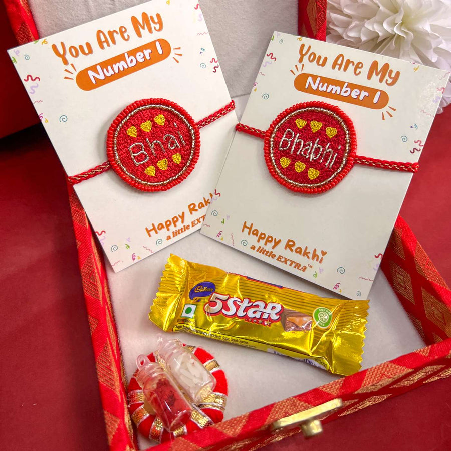 Handmade Beaded Rakhi Hamper For Bhaiya And Bhabhi Set Of 3 1 - Gift Box Presentation with Rakhis and Chocolate