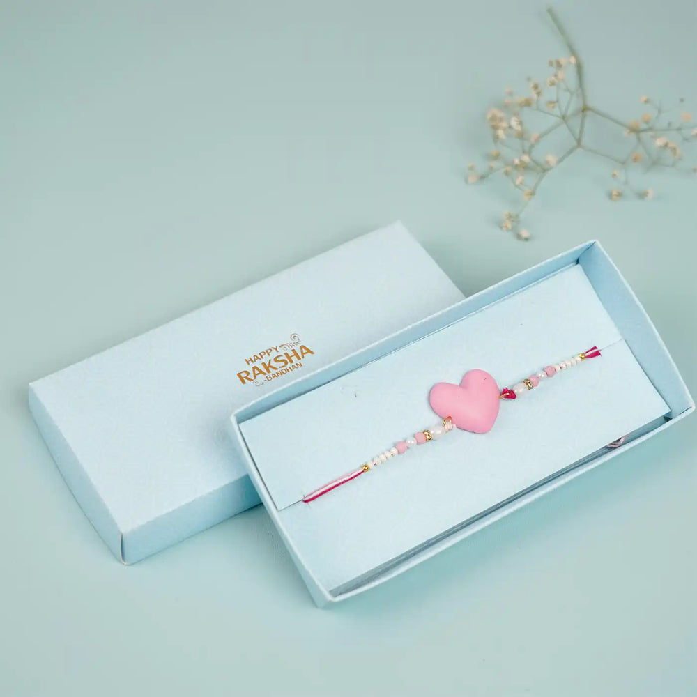 Handmade Beaded Pink Heart Shaped Clay Rakhi With Roli Chawal For Sisters - In Gift Box Packaging