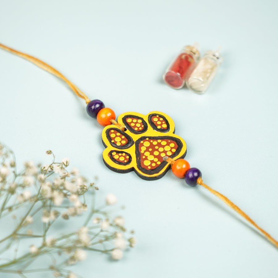 Hand Painted Paw Design Mdf Wood Kids Rakhi - Close-up of Bracelet Detail