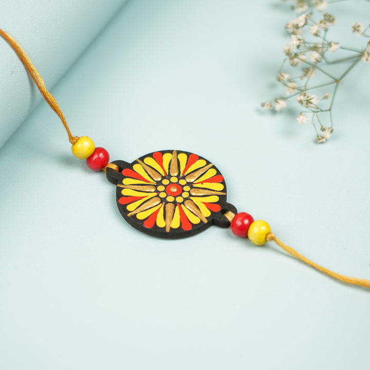 Customized Hand Painted Dot Mandala Ethnic Round Mdf Wood Rakhi - Flat Lay Front View with Background (6)