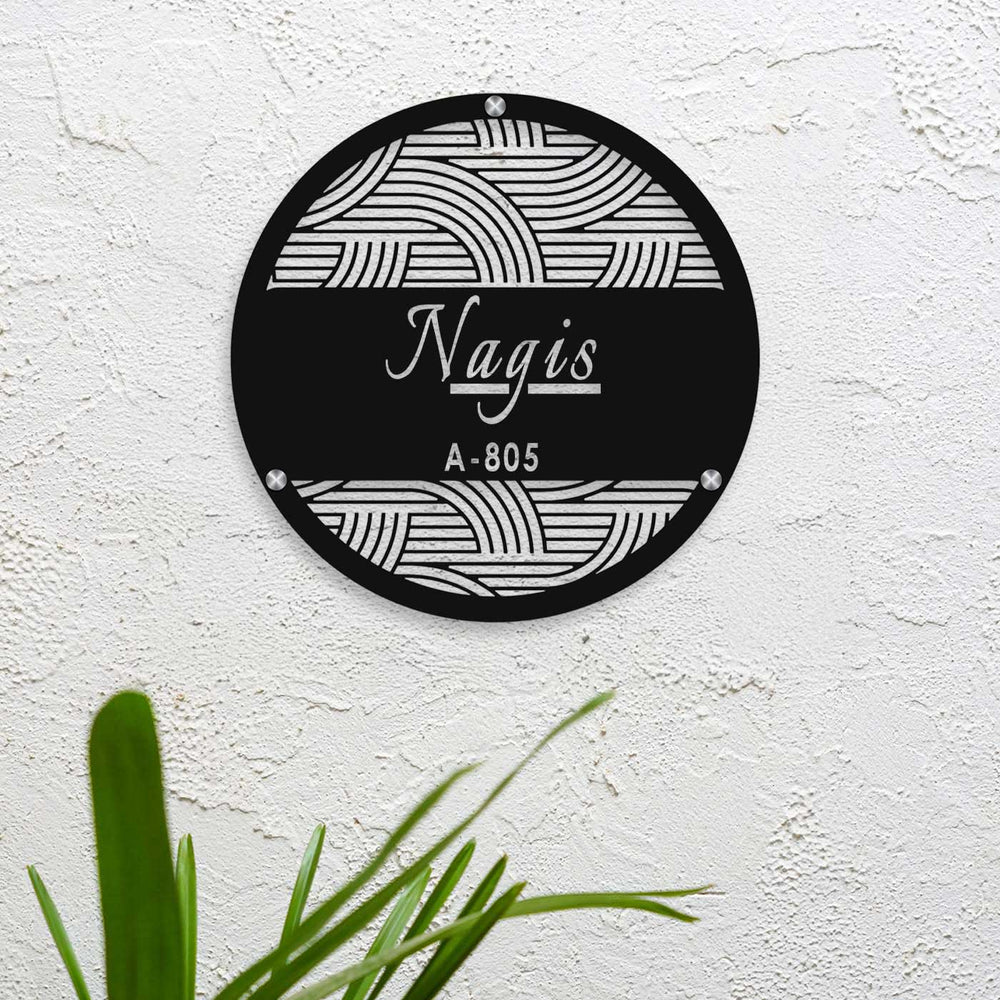 Personalized Laser Cut Round Steel Name Plate 1 - Mounted on White Wall with Screws