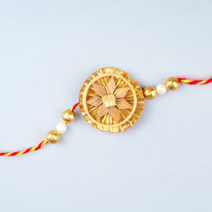 Ecofriendly Bamboo Rakhis For Bhaiya Bhabhi With Roli Chawal 7 - Close-up of Rakhi Centerpiece