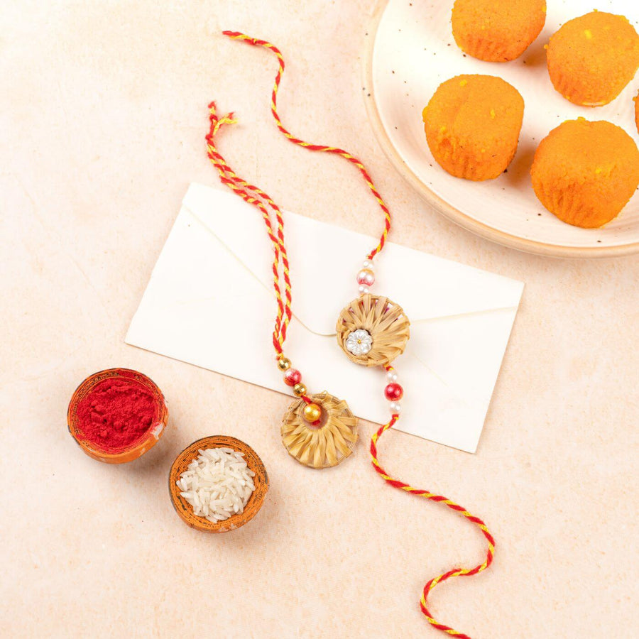 Ecofriendly Bamboo Rakhis For Bhaiya Bhabhi With Roli Chawal 2 - Styled Layout with Sweets and Holi Items
