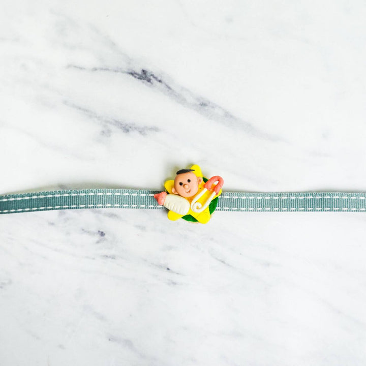 Handmade Porcelain Clay Themed Rakhi 8 - Flat Lay with Baby Star Charm