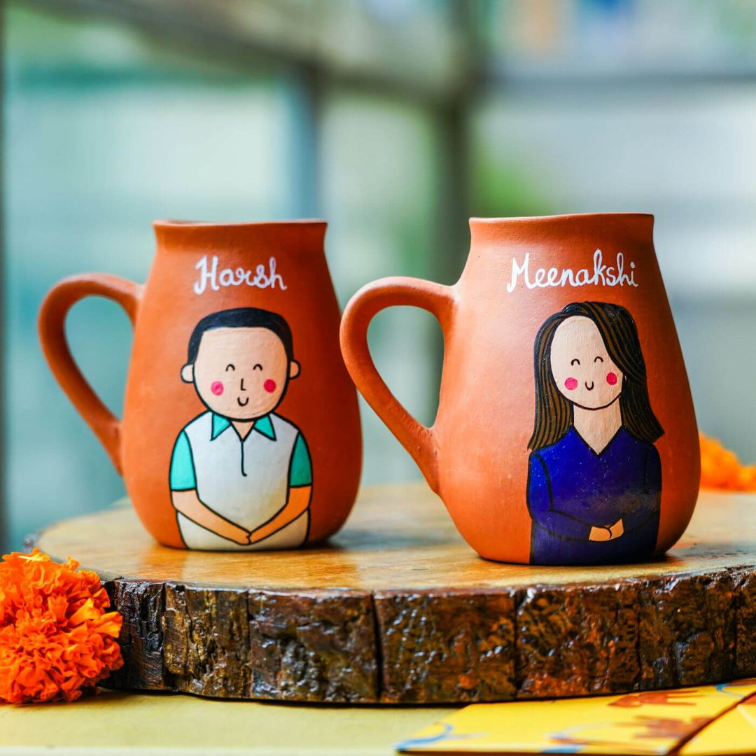Personalized Terracotta Mug Rakhi Set With Caricature - Side View of Two Personalized Mugs