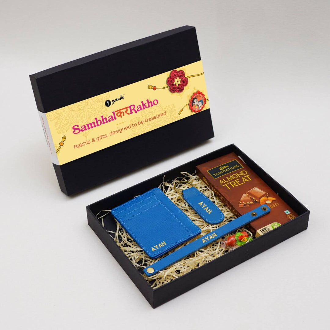 Personalised Rakhi Hamper With Genuine Leather Accessories - Gift Box Blue Flat Lay