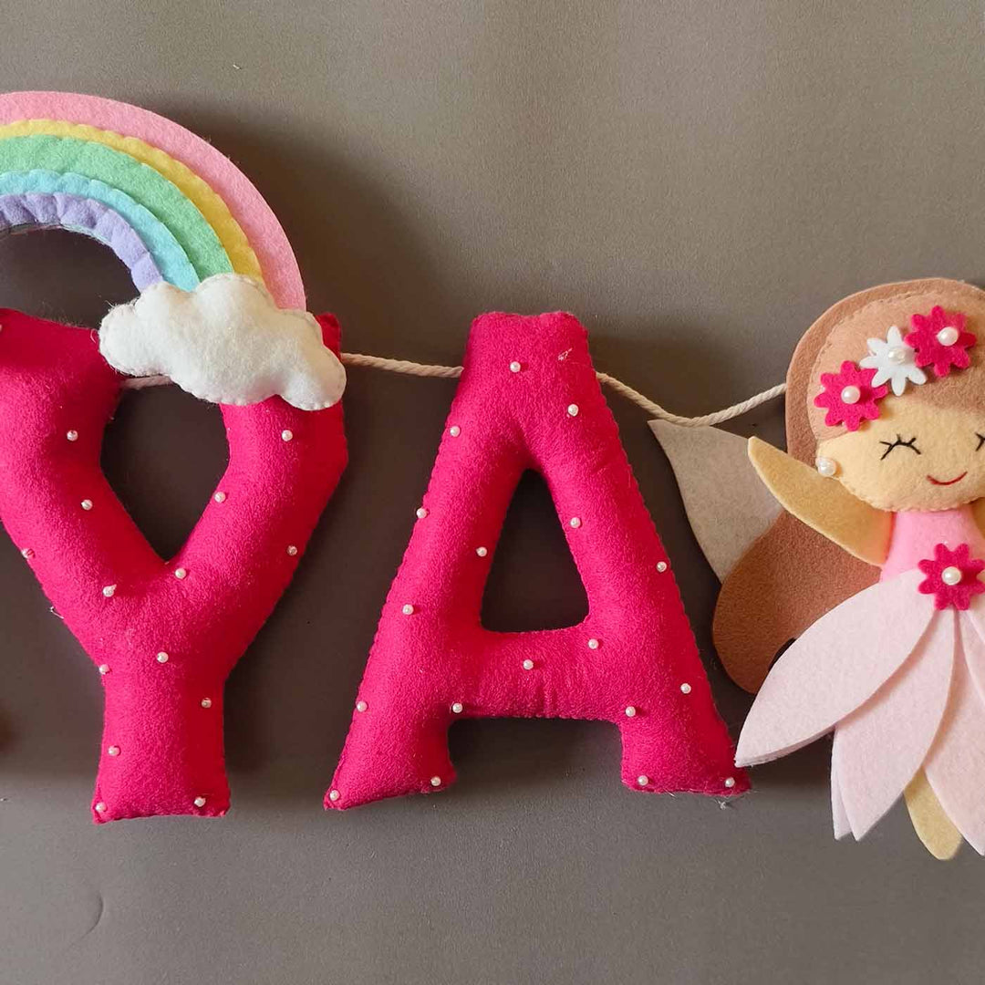 Hand Stitched Fairy Themed Felt Kids Name Plate - Close-up of Hanging Letter and Doll Garland