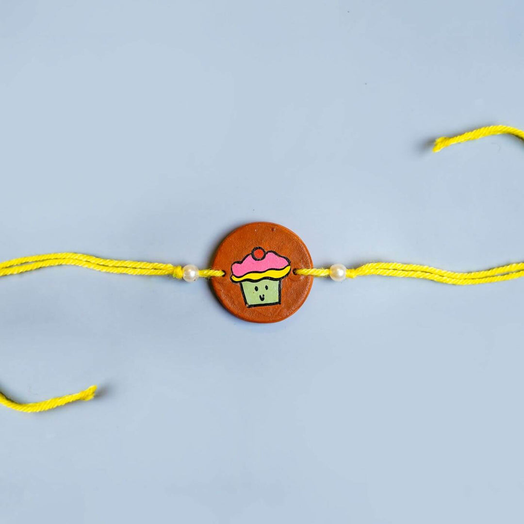 Personalized Food Theme Terracotta Rakhi With Roli Chawal 5 - Centered Rakhi with Knot Ends