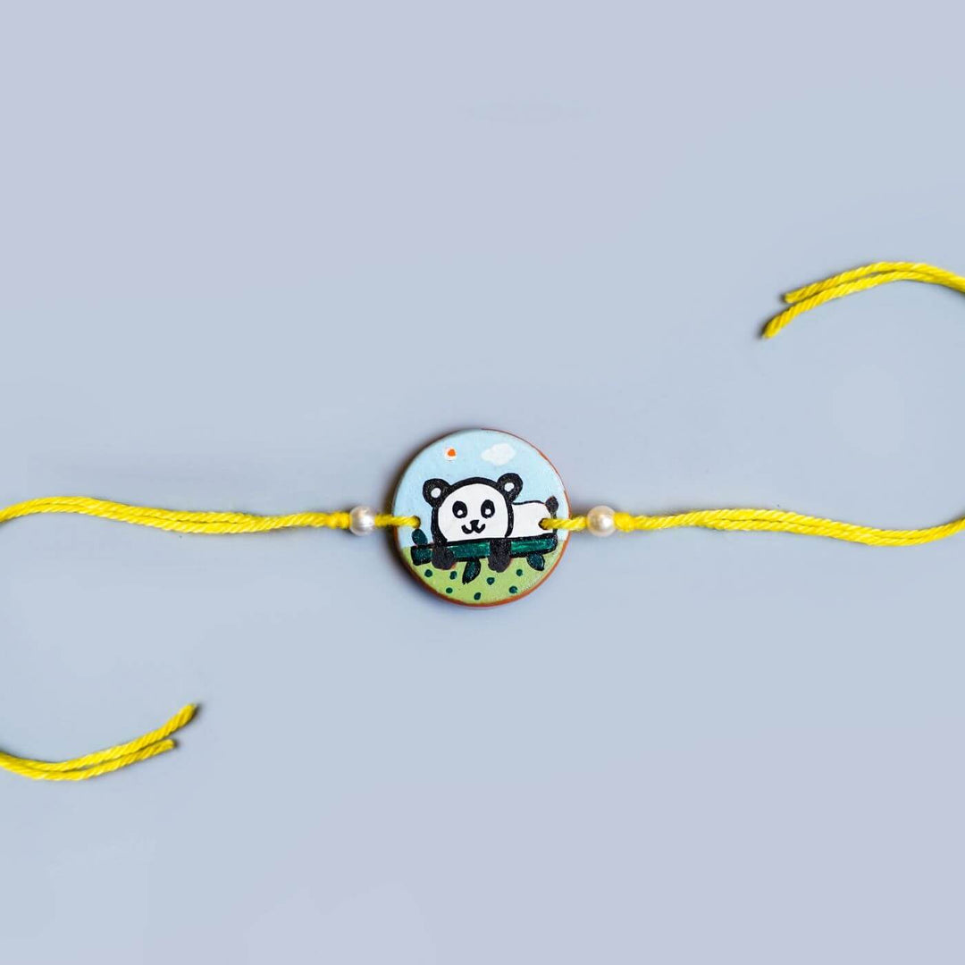 Personalized Animal Theme Terracotta Rakhi With Roli Chawal For Kids 5 - Flat Lay with Tied Ends