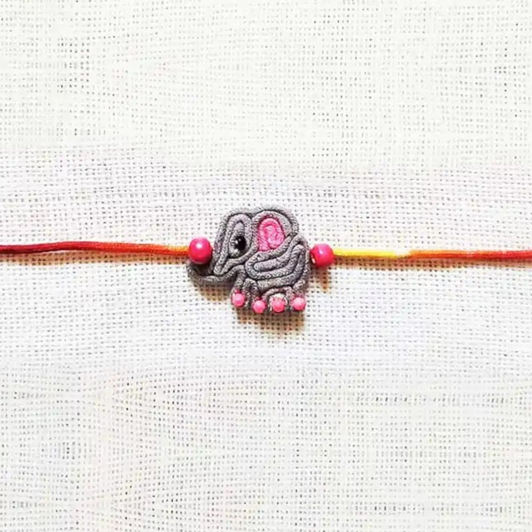 Handmade Dori Work Elephant Kids Rakhi With Roli Chawal - Close-up of Elephant Charm