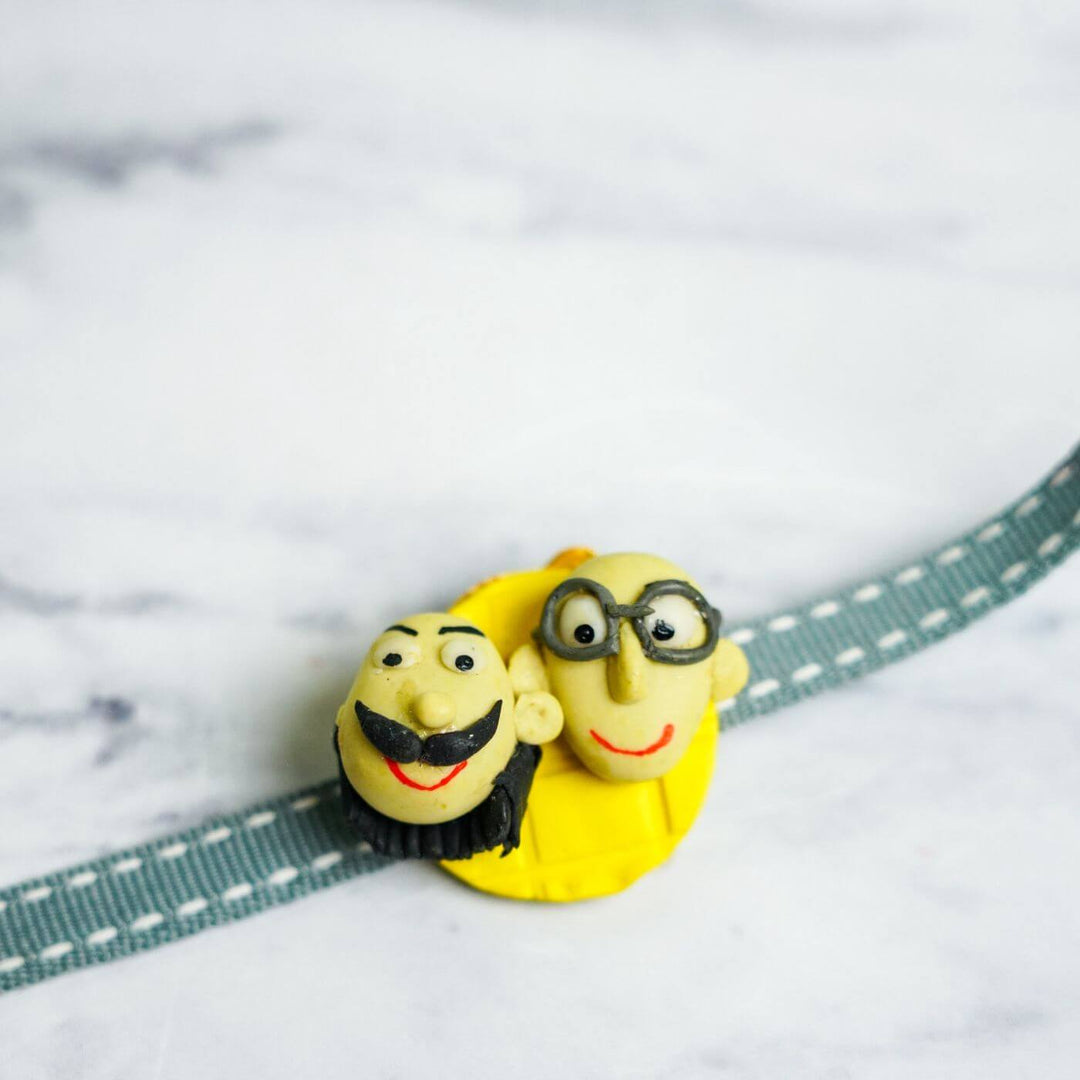 Handmade Porcelain Clay Themed Rakhi 4 - Close-up Face Detail