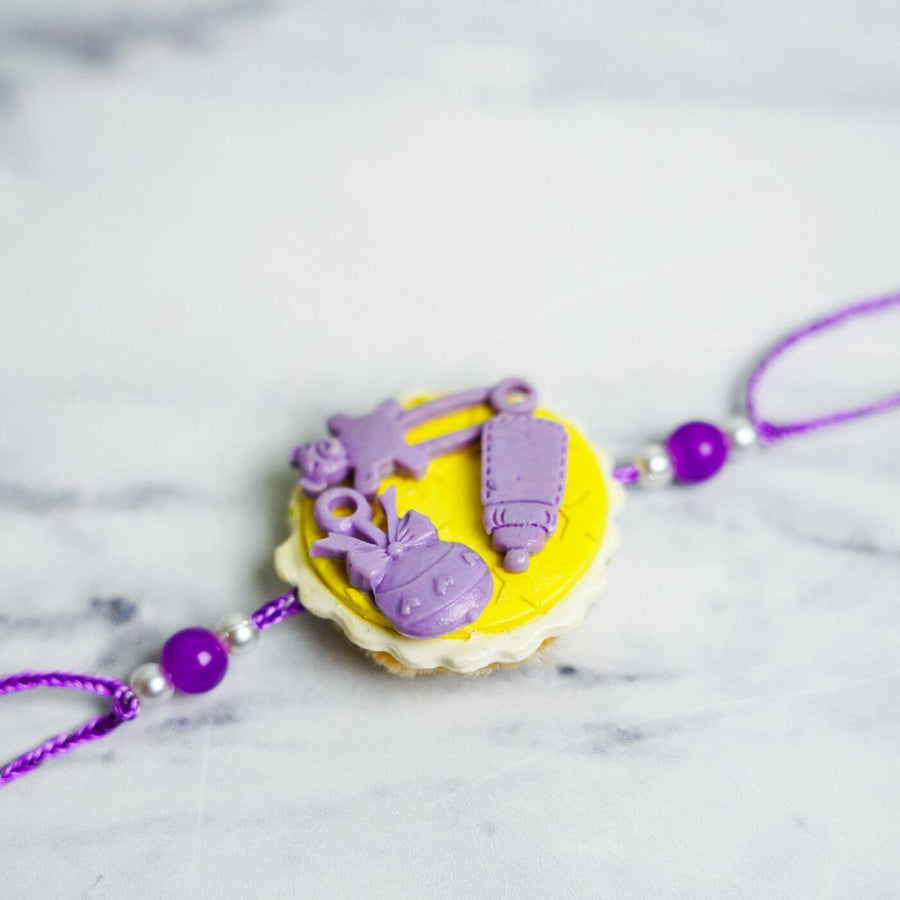 Handmade Porcelain Clay Themed Rakhi 11 - Close-up of Rakhi centerpiece