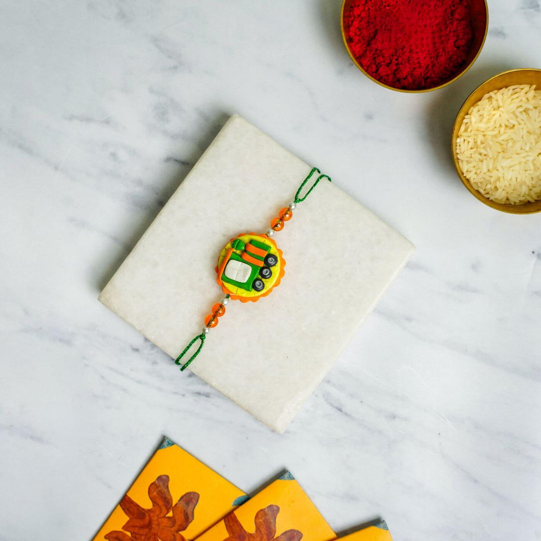 Handmade Porcelain Clay Themed Rakhi 5 - Rakhi on Gift Box Display