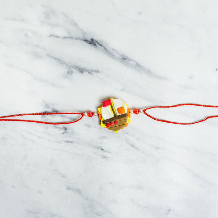 Handmade Porcelain Clay Themed Rakhi 10 - Flat Lay Front View
