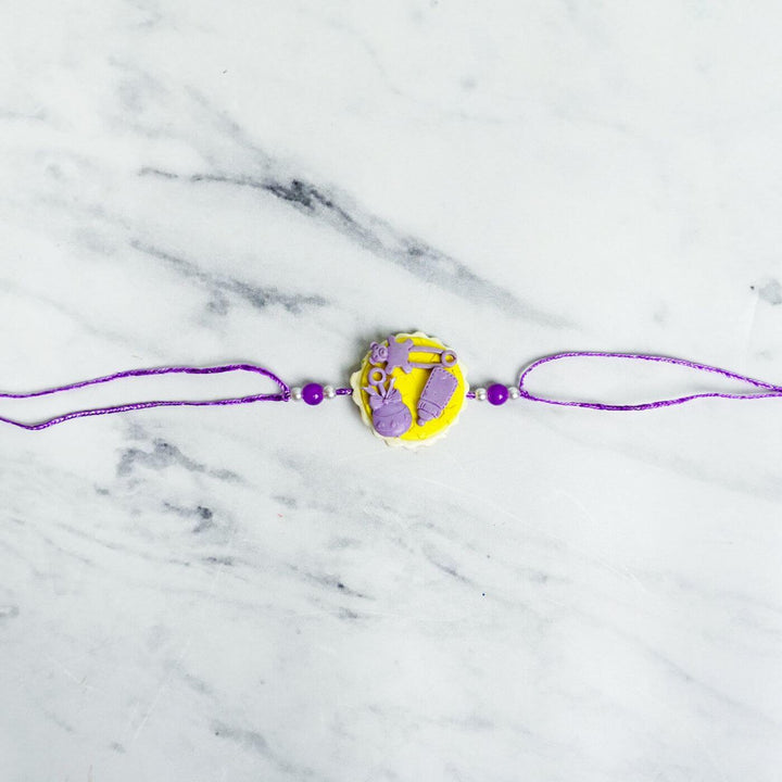 Handmade Porcelain Clay Themed Rakhi 11 - Full Rakhi with string extended