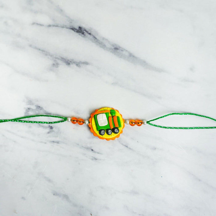 Handmade Porcelain Clay Themed Rakhi 5 - Flat Lay Front View