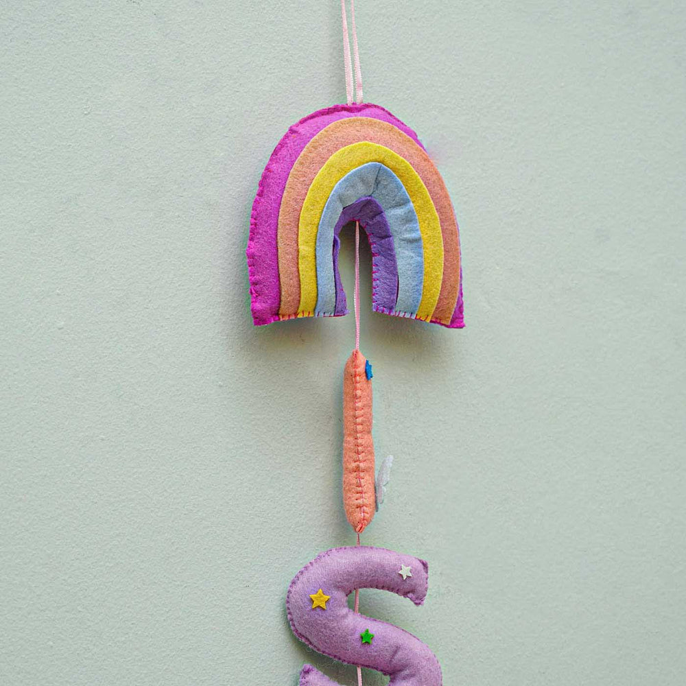 Personalized Handmade Rainbow Vertical Felt Bunting For Kids - Hanging View Against Wall Background