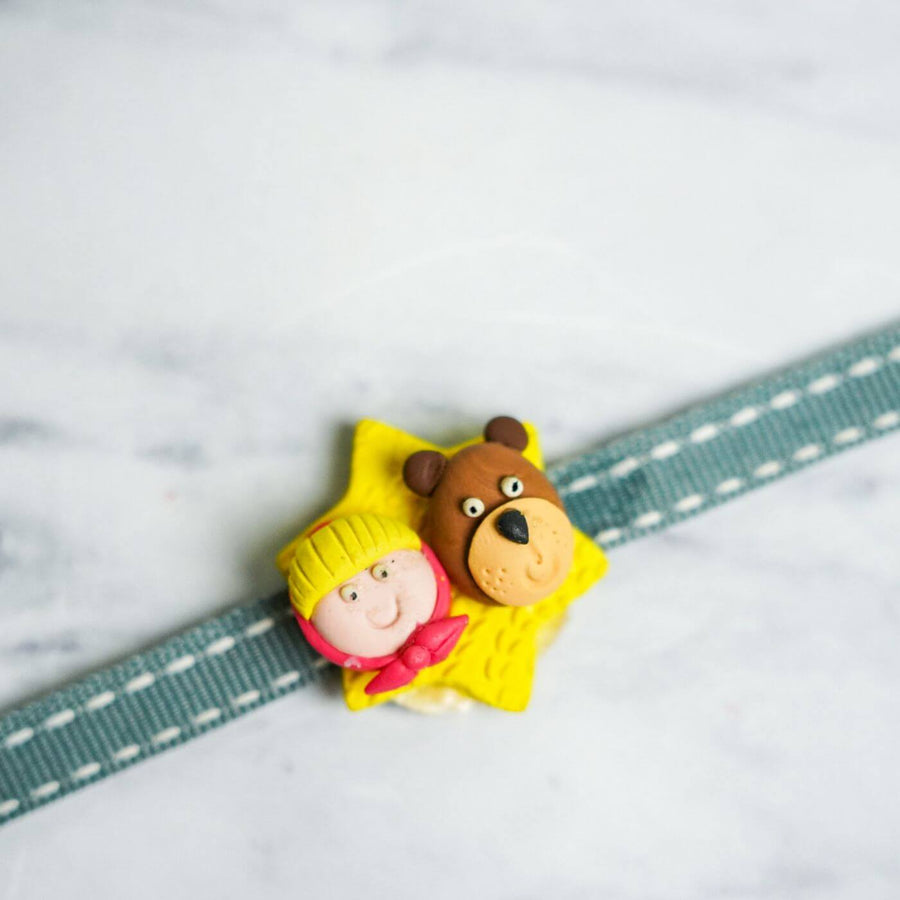 Handmade Porcelain Clay Themed Rakhi 3 - Close-up of decorative band