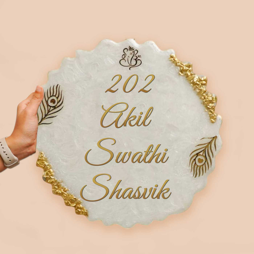 Personalized White And Gold Resin Name Plate For Family - Handheld Front View with Names