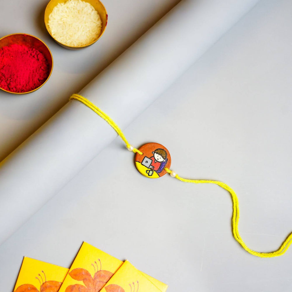 Personalized Profession Theme Terracotta Rakhi With Roli Chawal 4 - Styled Product Display with Accessories