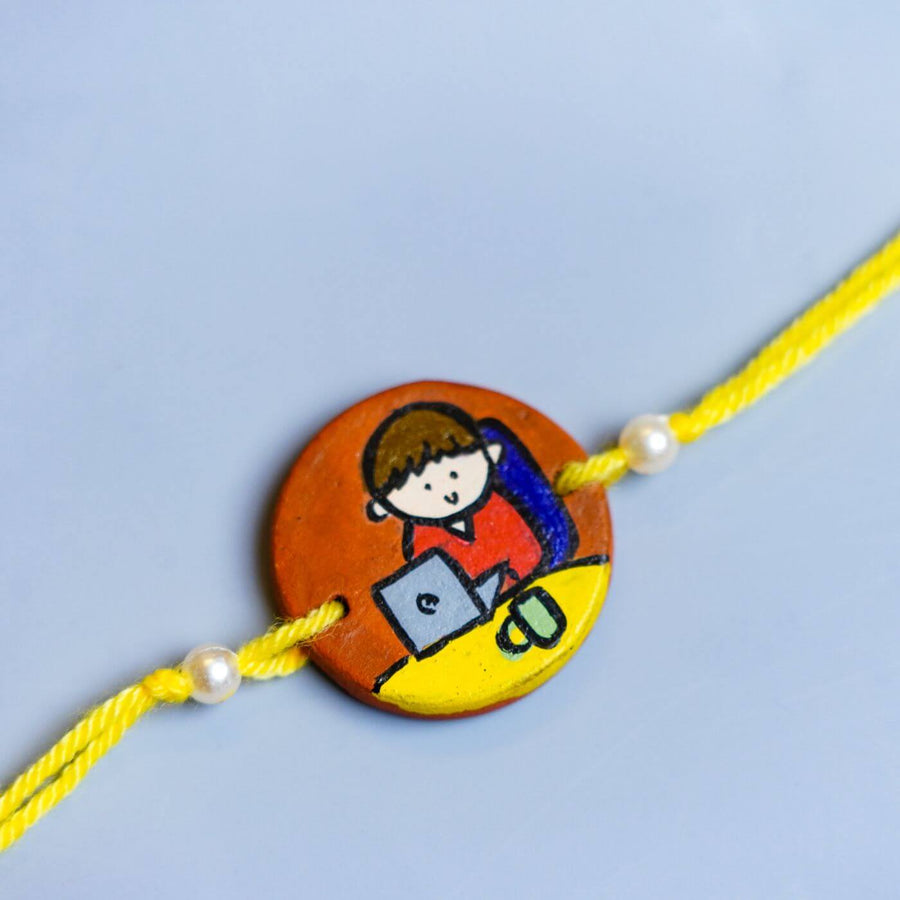 Personalized Profession Theme Terracotta Rakhi With Roli Chawal 4 - Close-up of Rakhi centerpiece