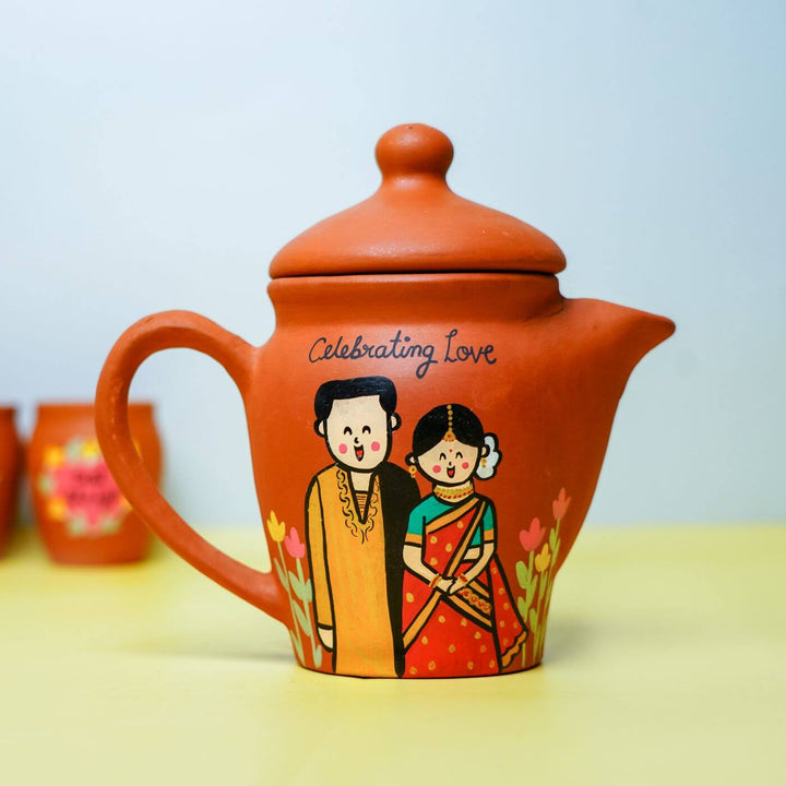 Personalized Terracotta Teaset Rakhi Hamper With Caricature - Pot Front Close-up