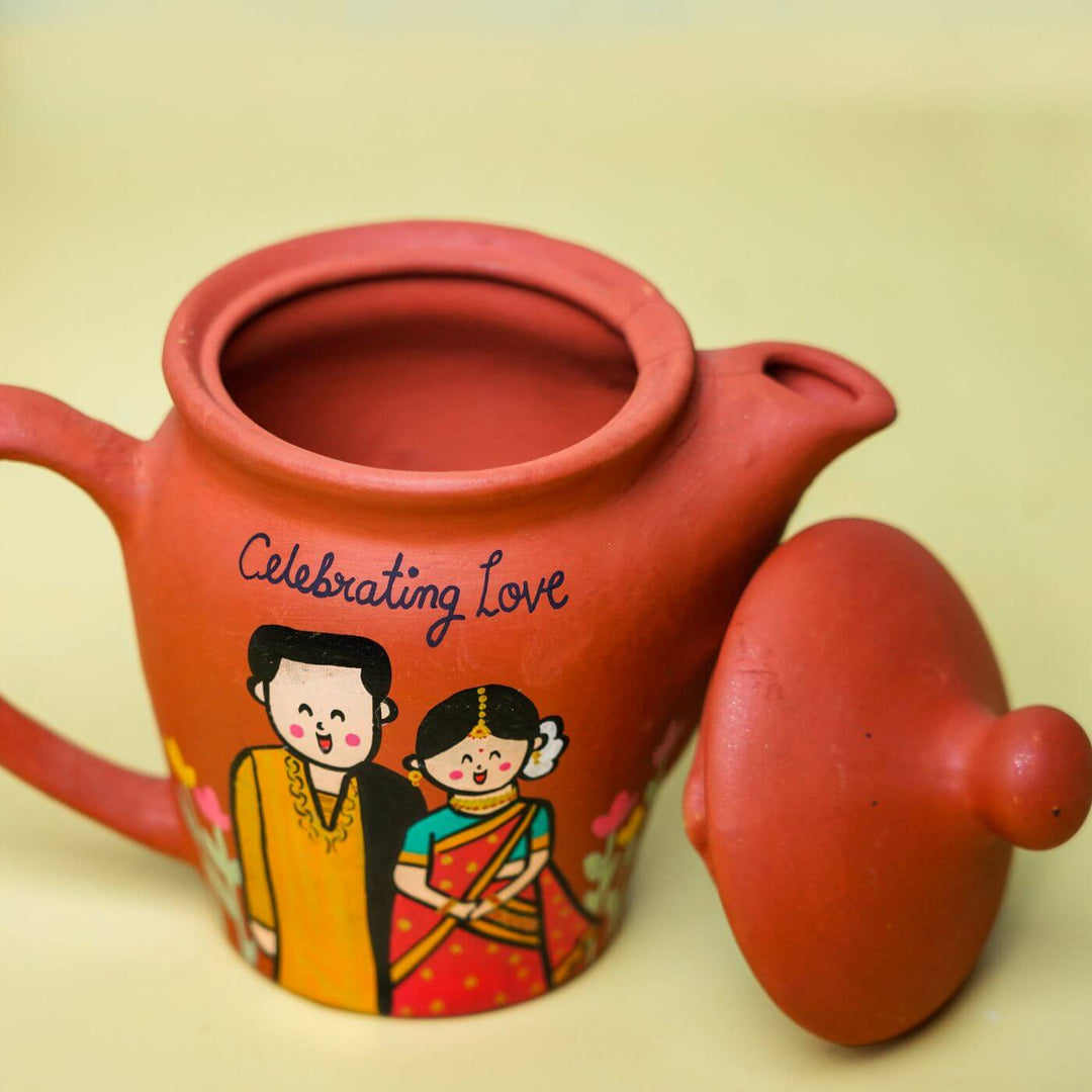 Personalized Terracotta Teaset Rakhi Hamper With Caricature - Pot Opening Close-up