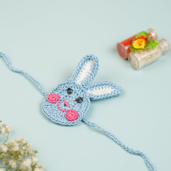 Handmade Crochet Bunny Theme Kids Rakhi With Roli Chawal - Front View Crochet Bunny Wristband