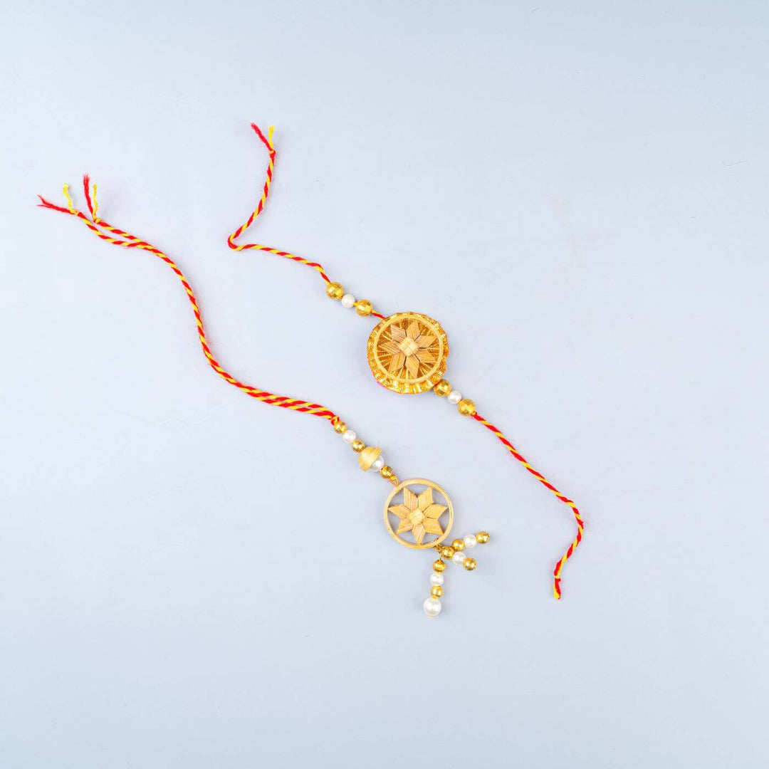 Ecofriendly Bamboo Rakhis For Bhaiya Bhabhi With Roli Chawal 7 - Two Rakhi Designs Laid Flat