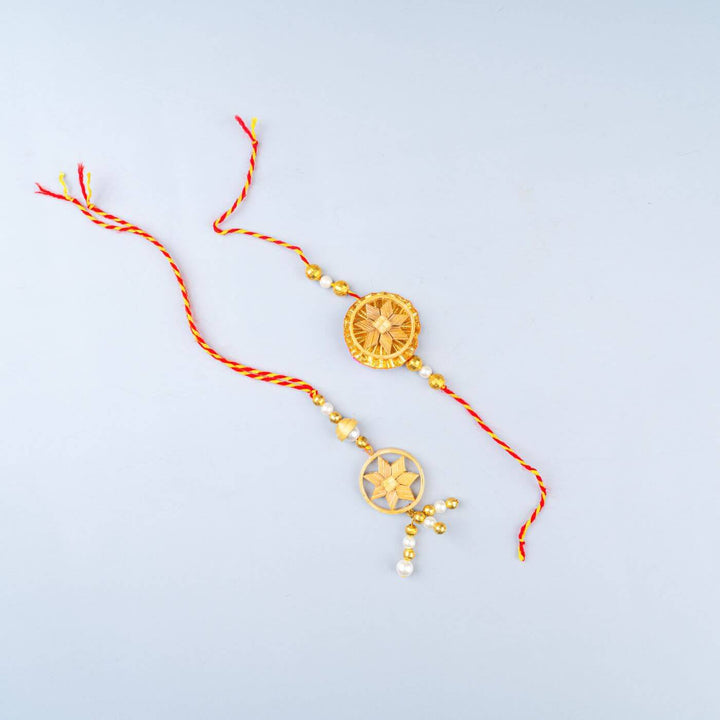 Ecofriendly Bamboo Rakhis For Bhaiya Bhabhi With Roli Chawal 7 - Two Rakhi Designs Laid Flat