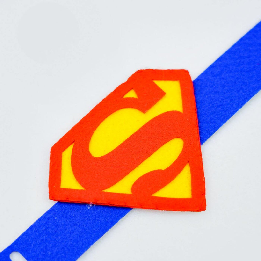 Kids Theme Felt Rakhi Band With Roli Chawal 6 - Close-up on Superman Logo