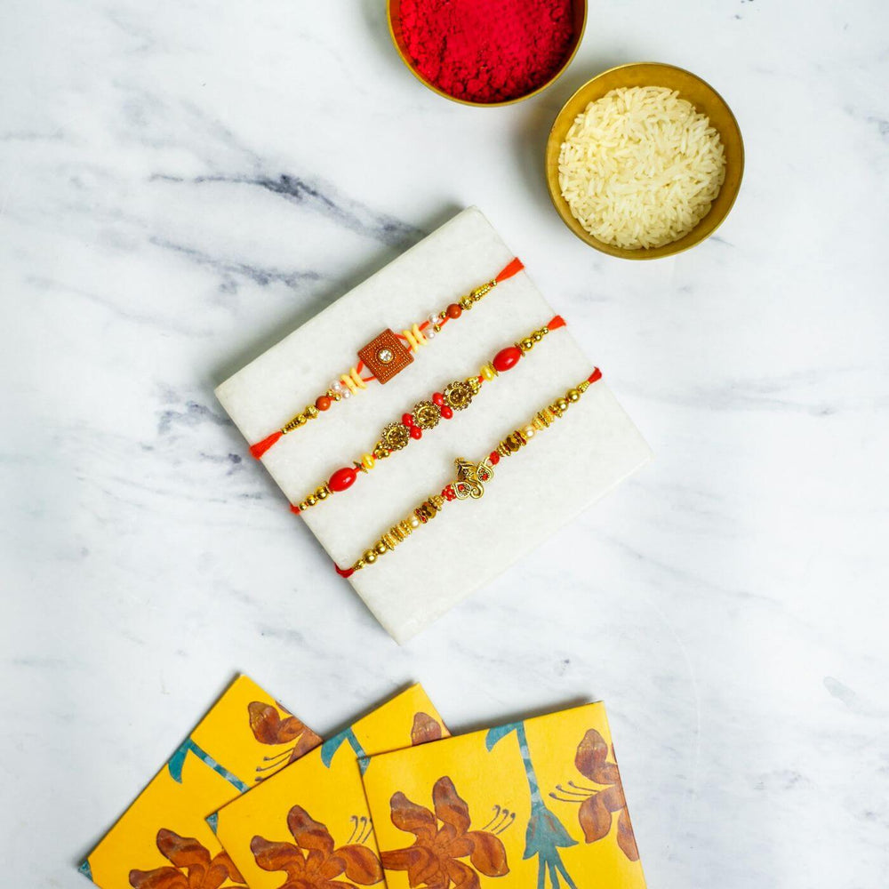 Embroidered Personalized Towel Rakhi Hamper 3 - Rakhis with Rice and Gulal Powder