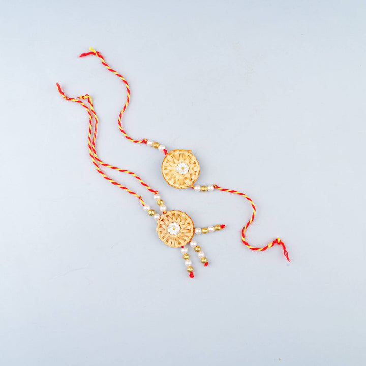 Ecofriendly Bamboo Rakhis For Bhaiya Bhabhi With Roli Chawal 3 - Pair of rose and bead rakhis