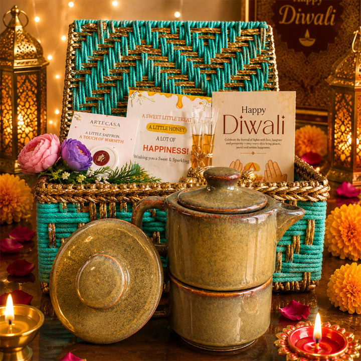 Green Chai & Diya Metal Jute Basket Diwali Gift Hamper With Tea Kettle, Mug And Matka Soy Wax Candle For Festive Gifting