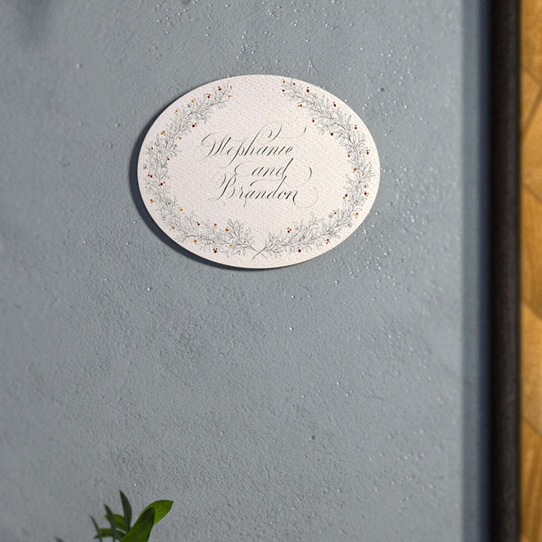 Delicate Calligraphy White Floral Name Plate - Mounted on Gray Wall Close-up
