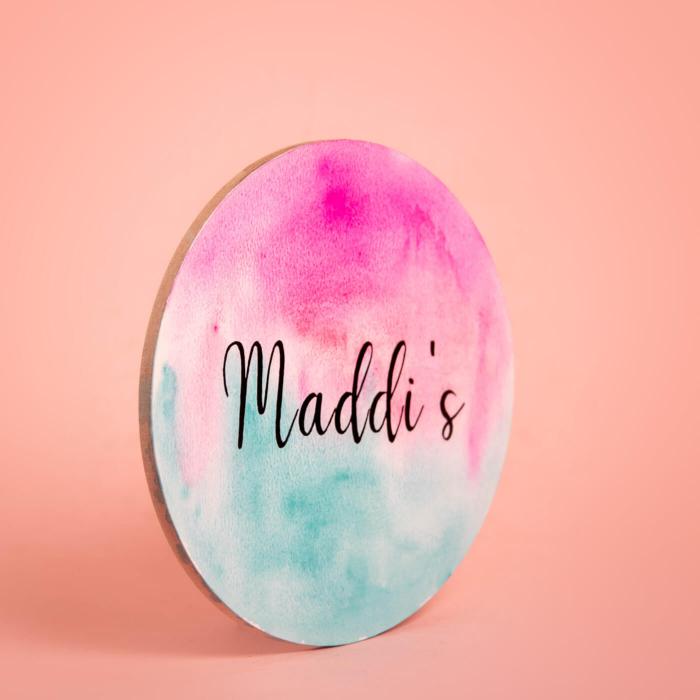Oval Hand Painted Name Plate 41 - Angled Front View on Surface