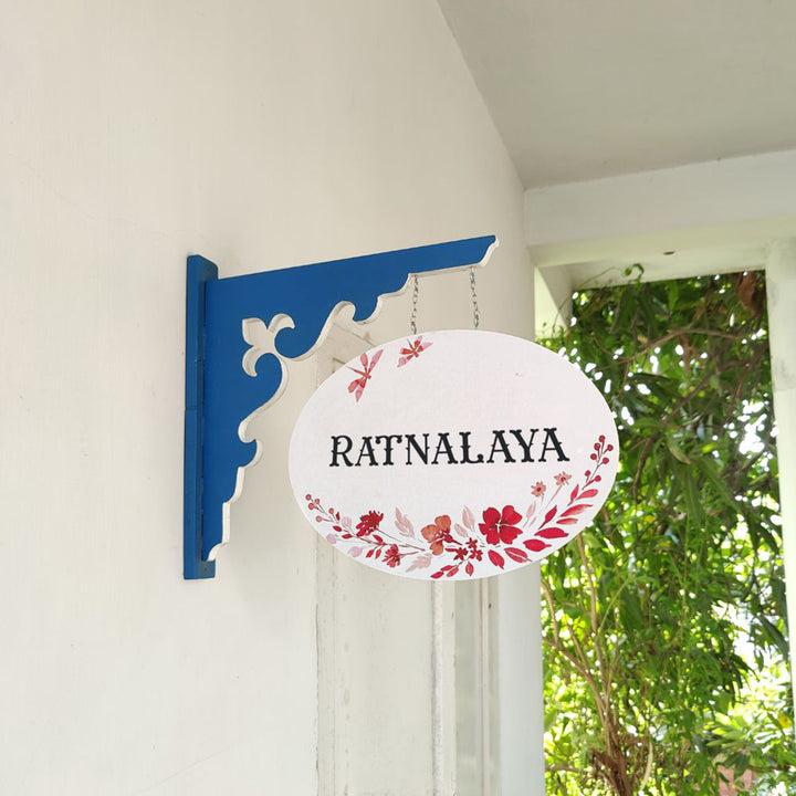 Hand Painted Oval Hanging Floral Name Plate - Side View Hanging from Bracket